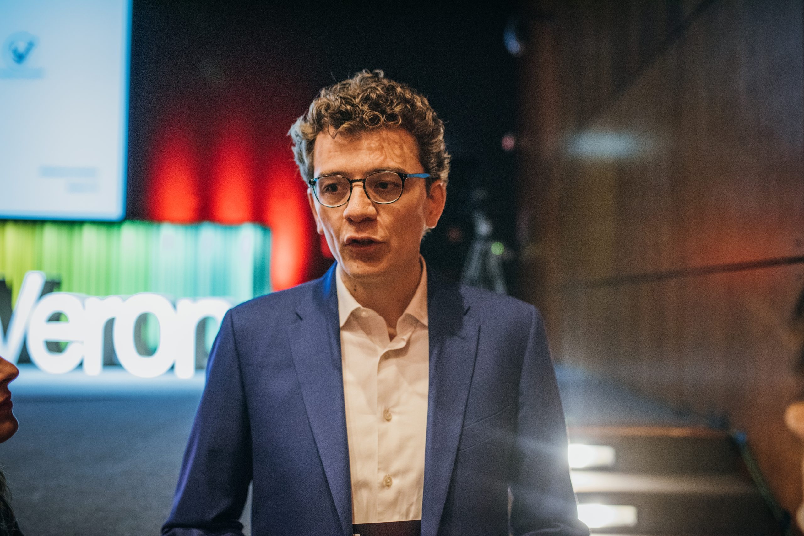 Portrait with TEDxVerona branding