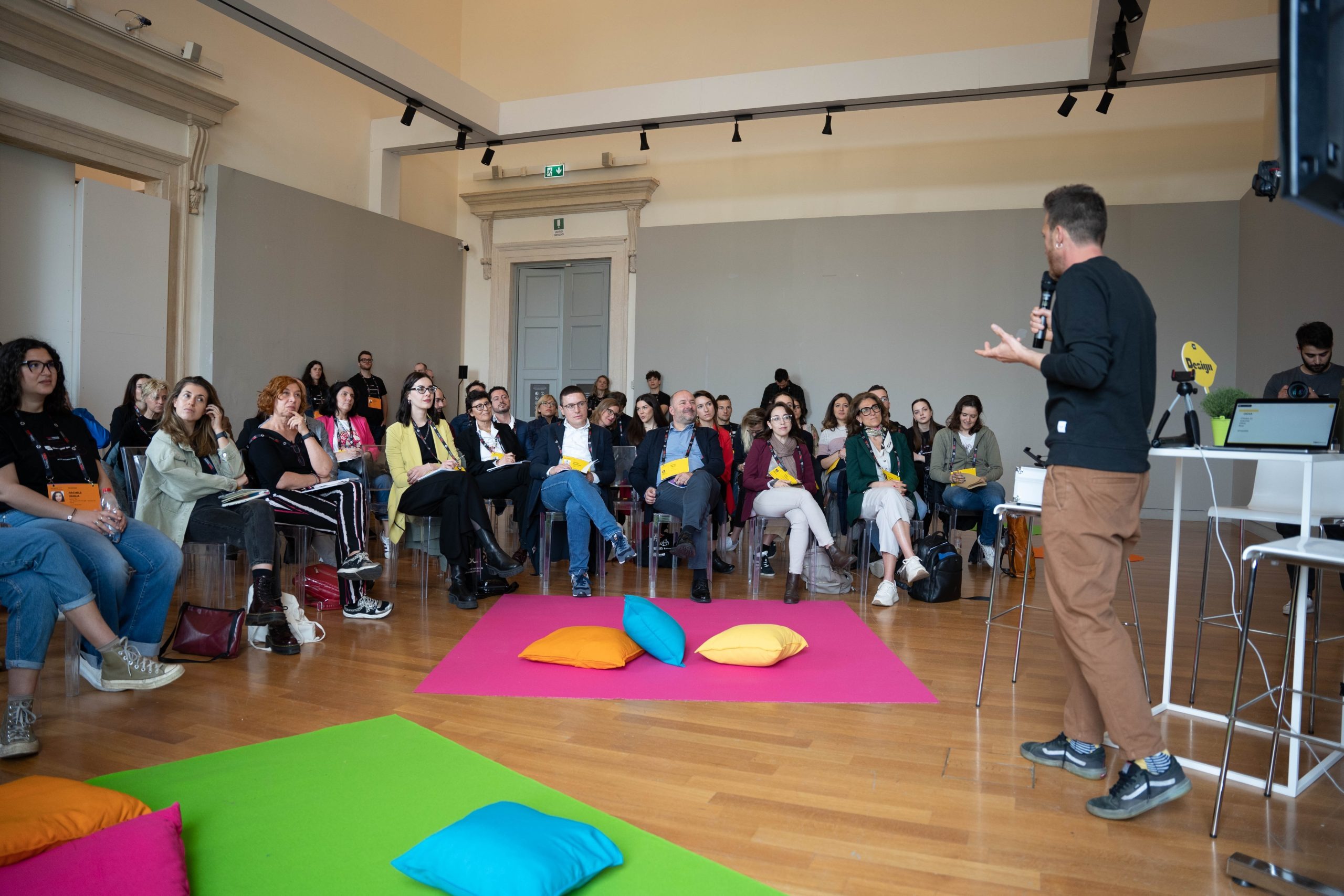 Workshop with colorful floor cushions